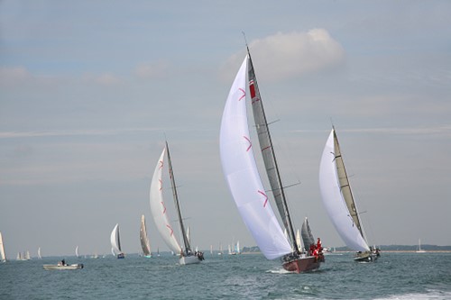 sailboats tacking in the wind