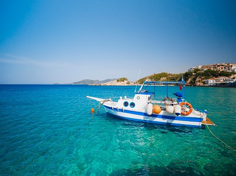 a boat anchored at sea